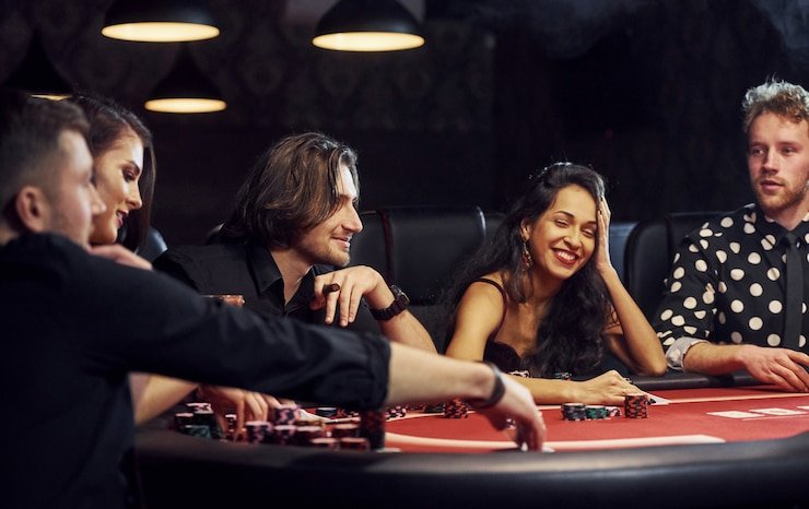 Live dealer at blackjack table in broadcast studio